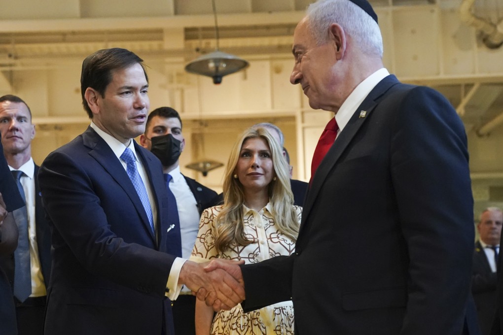 US Secretary of State Marco Rubio, left, and Israeli Prime Minister Benjamin Netanyahu shake hands as they visit the Western Wall Tunnels, in Jerusalem’s Old City, Israel on Sunday. Photo: Pool Photo via AP