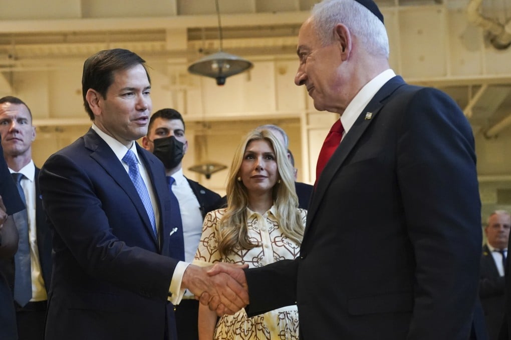 US Secretary of State Marco Rubio, left, and Israeli Prime Minister Benjamin Netanyahu shake hands as they visit the Western Wall Tunnels, in Jerusalem’s Old City, Israel on Sunday. Photo: Pool Photo via AP