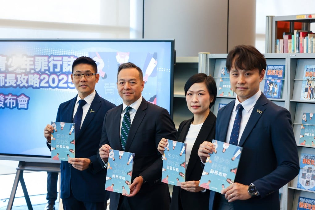 Authorities highlight this year’s edition of the youth crime prevention booklet during a press conference at police headquarters in Wan Chai. Photo: Dickson Lee