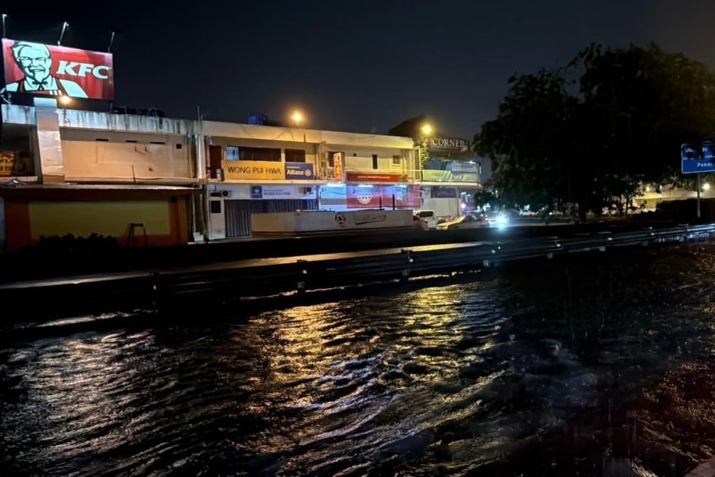 A flooded road in Kota Kinabalu after days of nonstop rain triggered by flash floods hit areas in and around Sabah’s capital over the past week. Photo: Facebook/GregoryTan