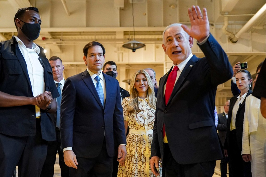 Israel’s Prime Minister Benjamin Netanyahu (right) briefs US Secretary of State Marco Rubio and his wife Jeanette Dousdebes Rubio during their visit to the Western Wall Tunnels, underneath the Jewish holy site, in the old city of Jerusalem on Sunday. Photo: AFP