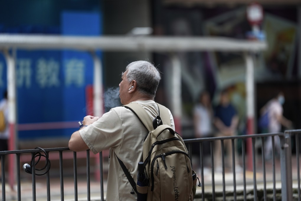 A man vapes in the street in Hang Hau. Even as Hong Kong tightens tobacco controls, a schools organisation has called for tougher measures, including banning vaping devices. Photo: Elson LI