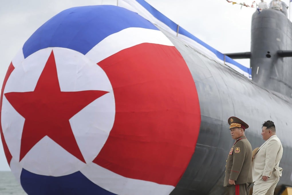 North Korean leader Kim Jong-un inspects what state media said is the country’s first tactical nuclear attack submarine, the Hero Kim Kun-ok, in 2023. Photo: KCNA via AP