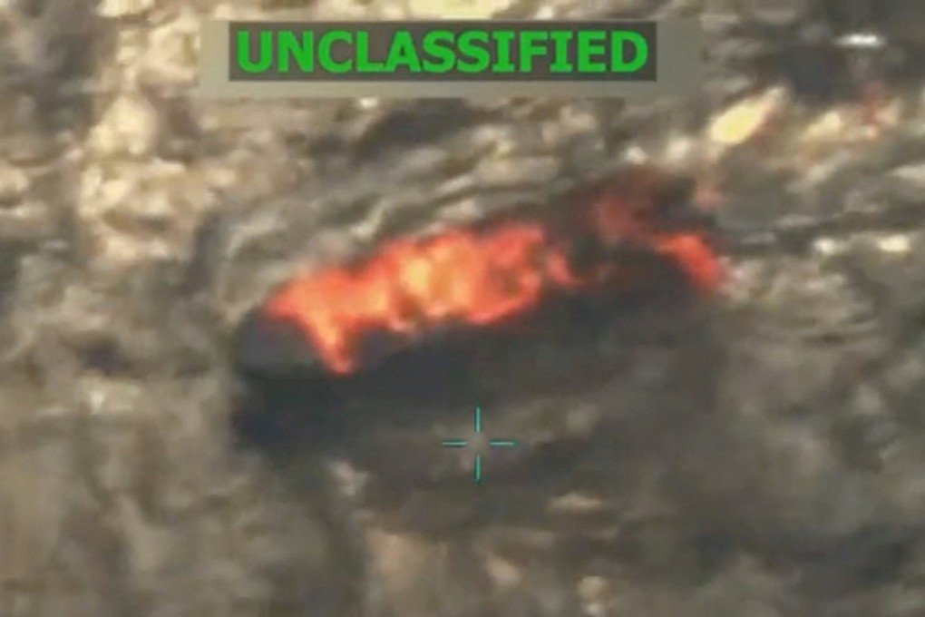 A vessel burns in footage released on Monday depicting what US President Donald Trump said was an American military strike on a Venezuelan drug cartel vessel. Photo: Truth Social/realDonaldTrump via Reuters