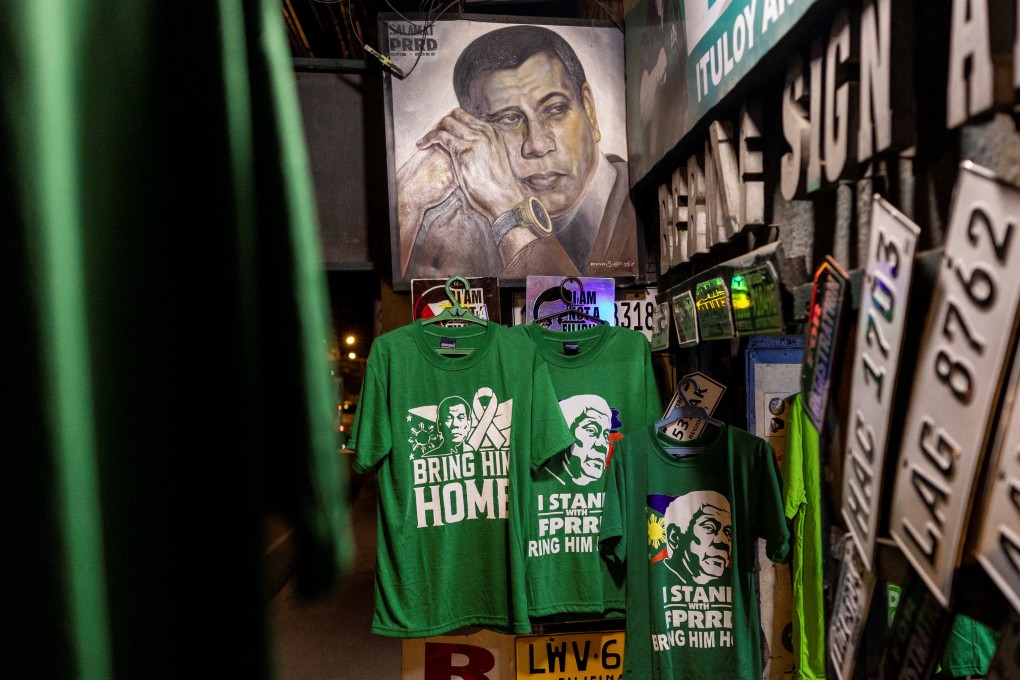 T-shirts and other memorabilia calling for the return of former president Rodrigo Duterte to the Philippines are seen for sale at a shop in Davao City in March. Photo: Reuters