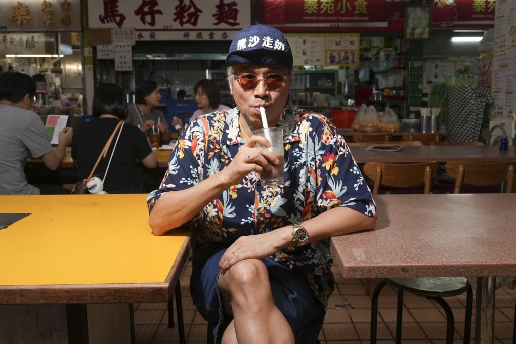 Kent Wong, aka Uncle K, at Lok Yuen, a traditional Hong Kong-style cha chaan teng cafe in Kowloon City. The content creator has risen to Instagram fame in recent months with his videos about Hong Kong restaurants. Photo: Sam Tsang