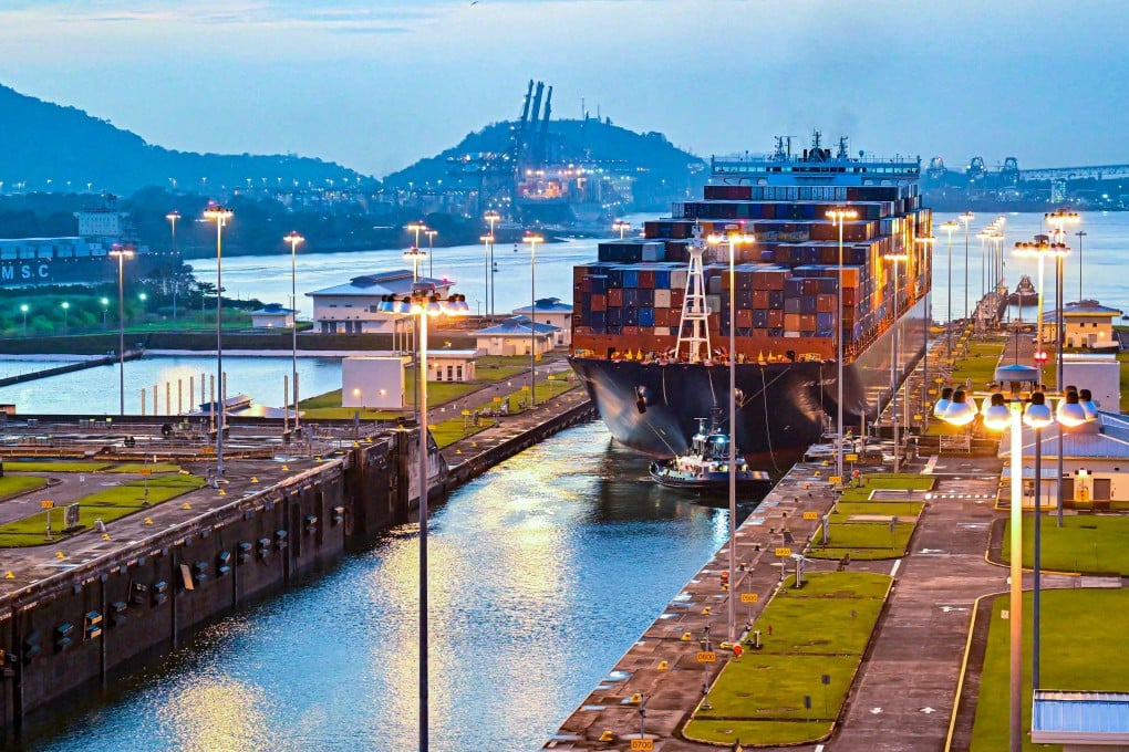 A cargo ship transits through Panama Canal Cocoli locks in Panama City on February 21. Photo: AFP