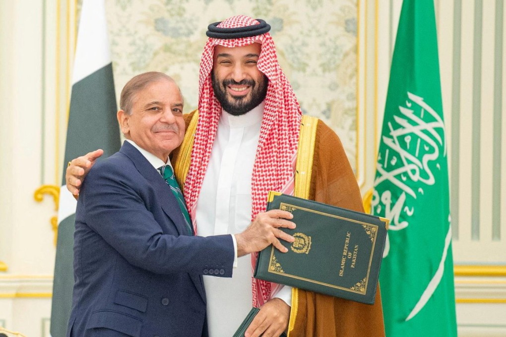 Saudi Crown Prince Mohammed bin Salman and Pakistan Prime Minister Shehbaz Sharif embrace at the signing of a defence agreement, in Riyadh, Saudi Arabia, on Wednesday. Photo: Saudi Press Agency via Reuters