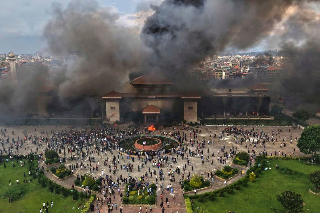 Protesters torch the Singha Durbar palace, which houses various Nepali government offices, during violent demonstrations in Kathmandu on September 9. The protests reportedly caused more than 70 deaths. Photo: AP