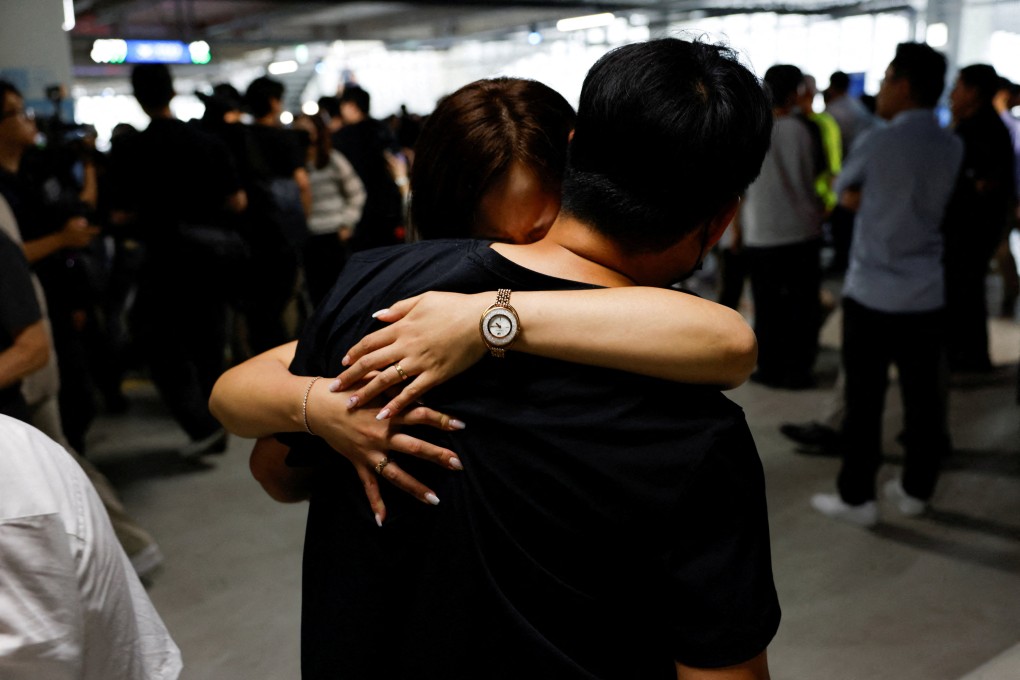 A South Korean worker, who was detained in a US immigration raid, is welcomed by a family member at Incheon airport on September 12. Photo: Reuters