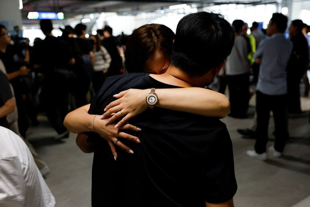 A South Korean worker, who was detained in a US immigration raid, is welcomed by a family member at Incheon airport on September 12. Photo: Reuters