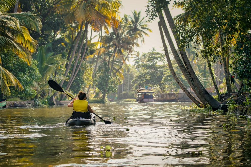 A woman on the backwaters of Kerala. The amoeba lives in warm lakes and rivers and is contracted by contaminated water entering the nose. It does not spread from person to person. Photo: Shutterstock