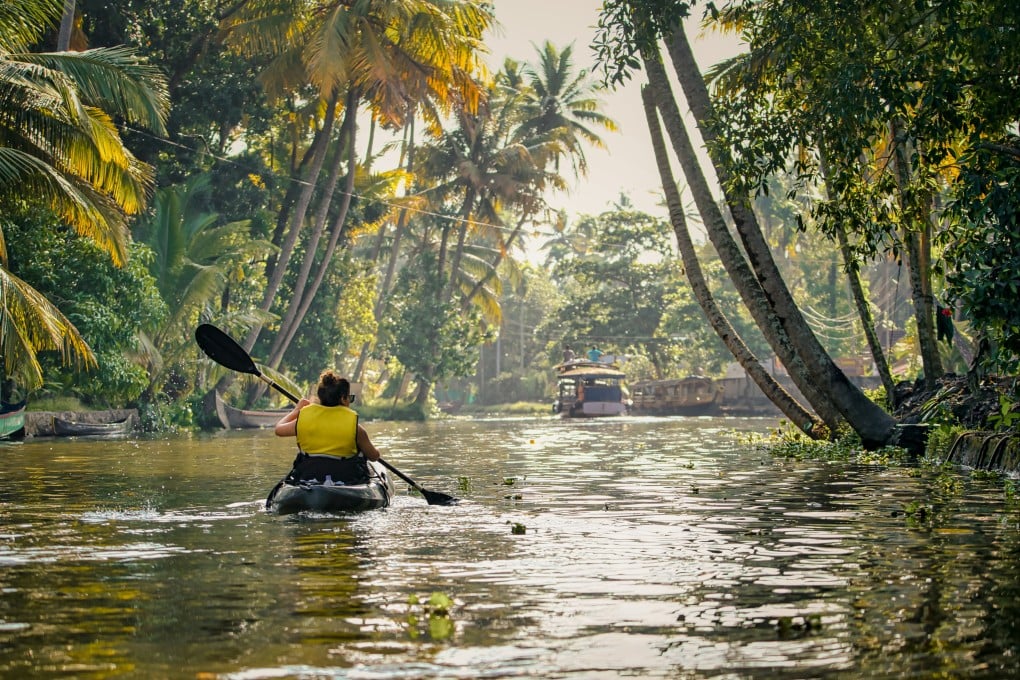 A woman on the backwaters of Kerala. The amoeba lives in warm lakes and rivers and is contracted by contaminated water entering the nose. It does not spread from person to person. Photo: Shutterstock