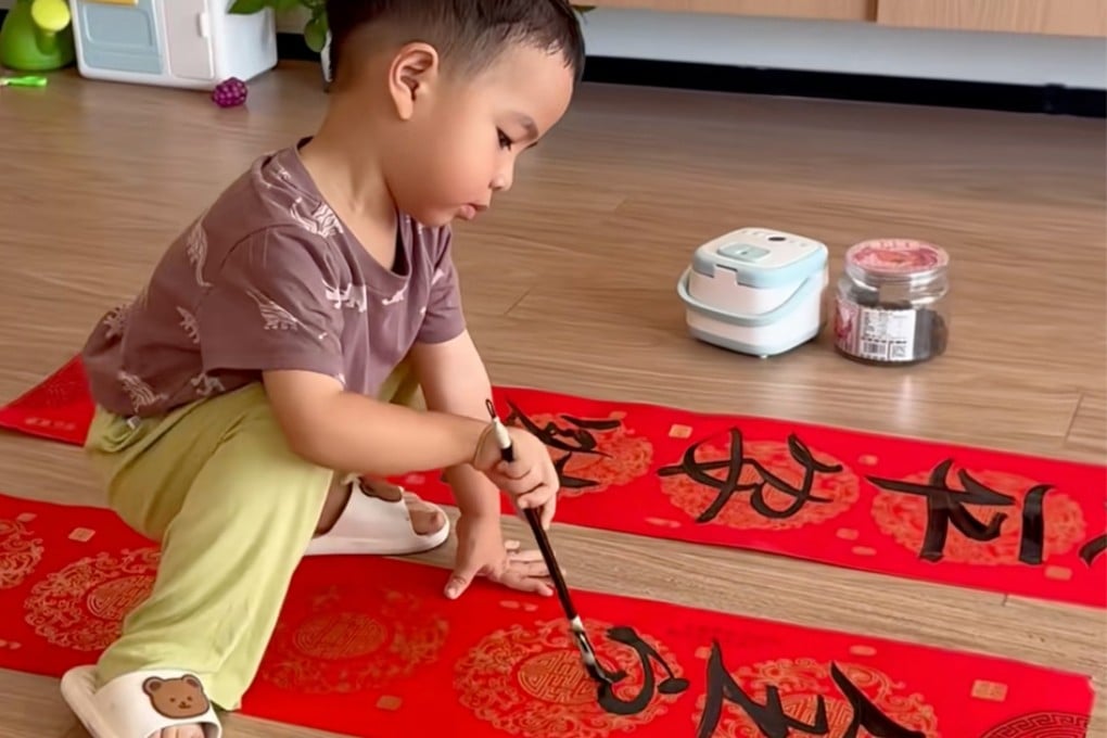 A three-year-old boy in China has gone viral for his impressive calligraphy skills. Photo: Douyin