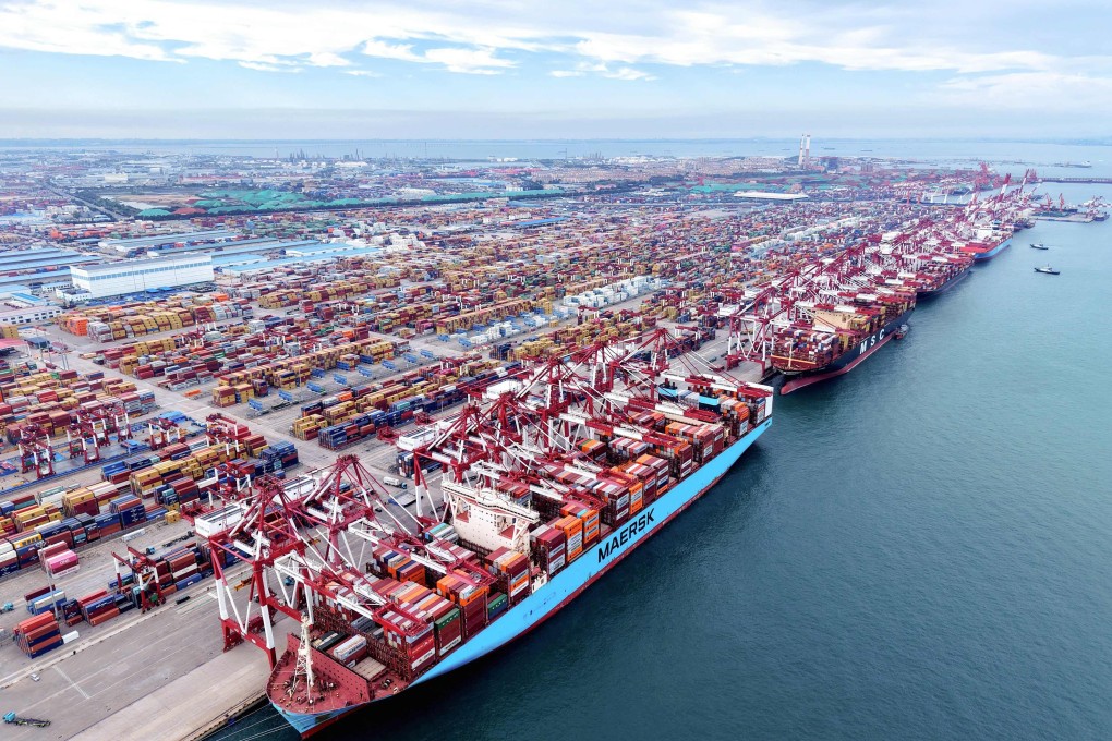 Shipping containers are loaded onto cargo ships at a port in Qingdao, in eastern China’s Shandong province. Photo: AFP