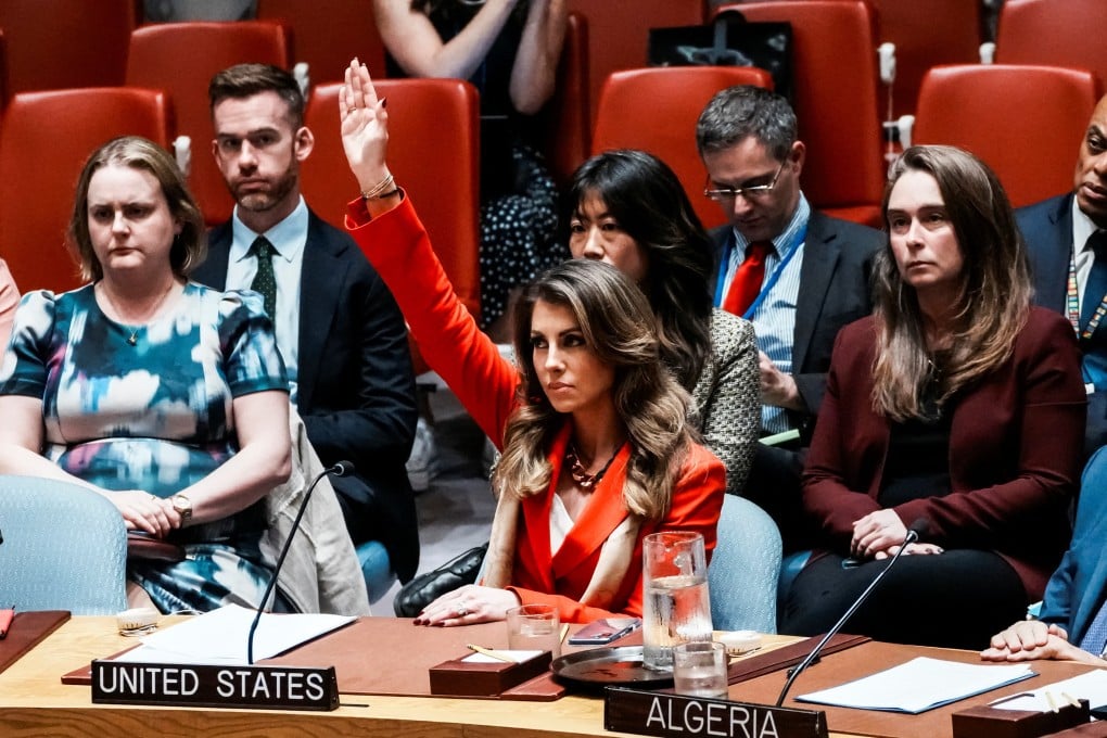 Deputy United States Special Envoy to the Middle East Morgan Ortagus raises her hand to cast a veto on a draft resolution demanding a ceasefire in Gaza at UN headquarters in New York on Thursday. Photo: Reuters