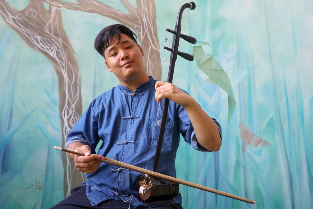 Yang Enhua plays the erhu. The visually impaired Chinese musician – who recently placed as a top 10 finalist in New York – talks to the Post about overcoming challenges and spreading traditional Chinese music around the world. Photo: Edmond So