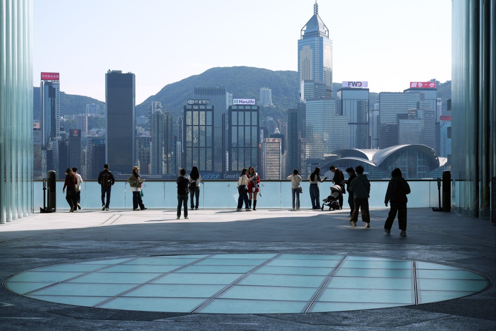 People take in the view of Hong Kong’s skyline from Tsim Sha Tsui on February 10. Photo: Eugene Lee