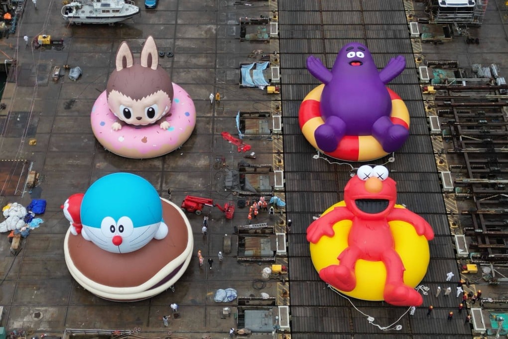 Inflatable characters of Labubu, Doraemon, Grimace and Elmo are set up ahead of the “Water Parade By AllRightsReserved at Victoria Harbour” event. Photo: Elson Li