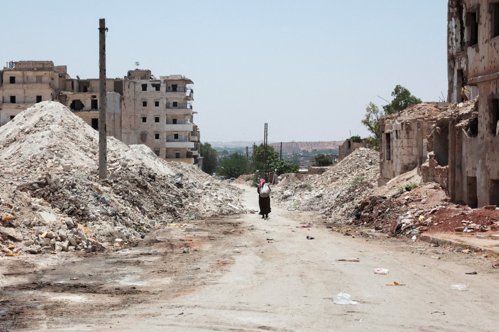A man walks among the destruction in the city of Aleppo, Syria, on June 23. Photo: Reuters