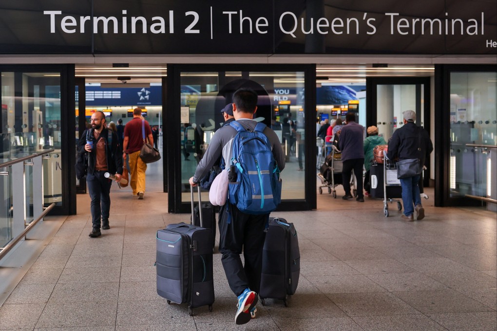 A traveller arrives at Heathrow Airport Terminal 2 on Saturday. Photo: Reuters