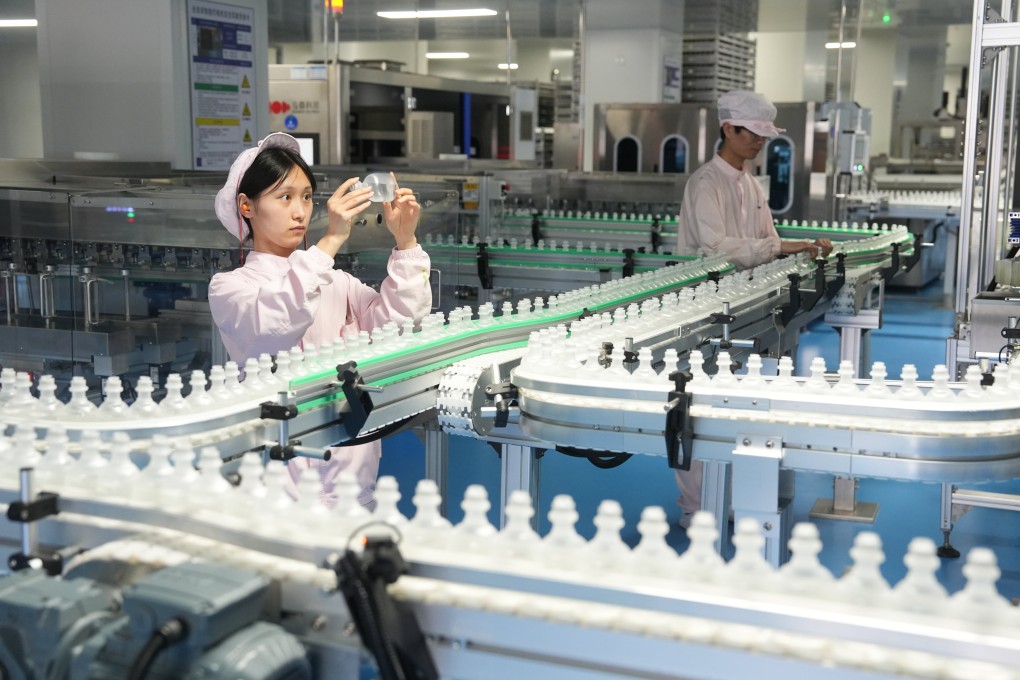 Employees work on the production line of Shijiazhuang No 4 Pharmaceutical in Shijiazhuang, Hebei province. Photo: VCG/VCG via Getty Images