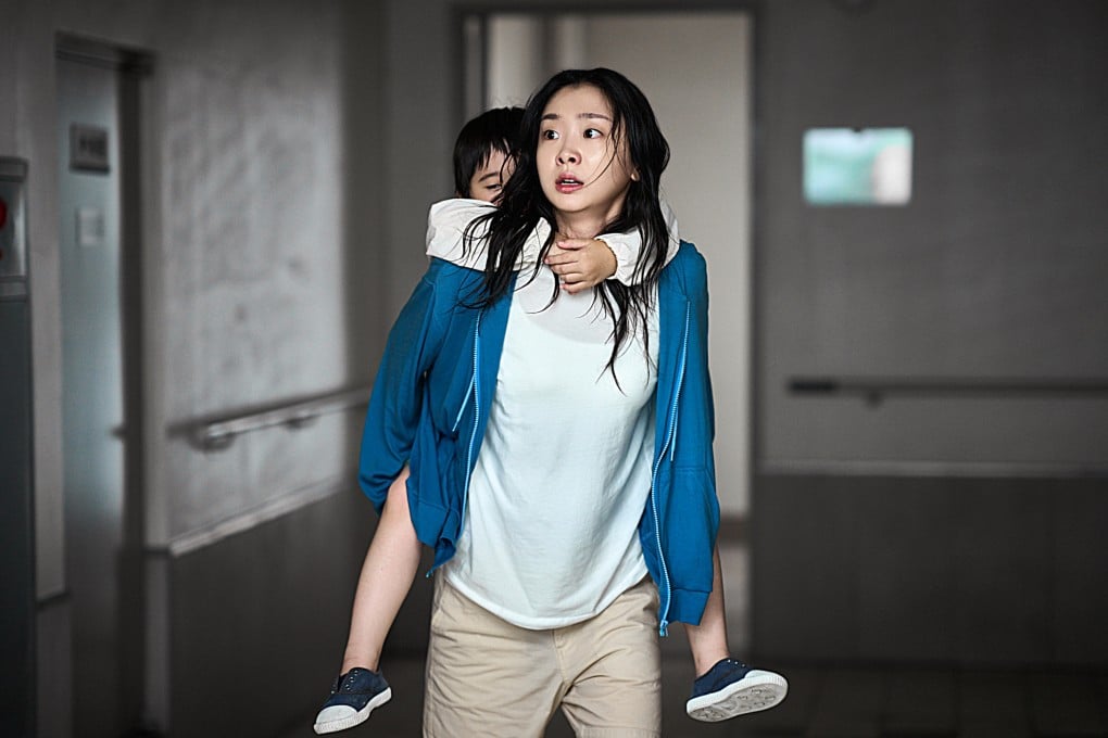 Kim Da-mi as AI developer An-na and Kwon Eun-seong as her son Ja-in in a still from the Netflix’s new Korean movie The Great Flood. Photo: Netflix