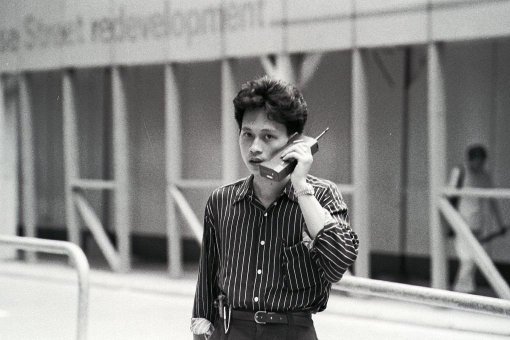A man talking on a mobile phone in 1989. At the time, only the wealthy could afford hand-held devices. Photo: SCMP Archives