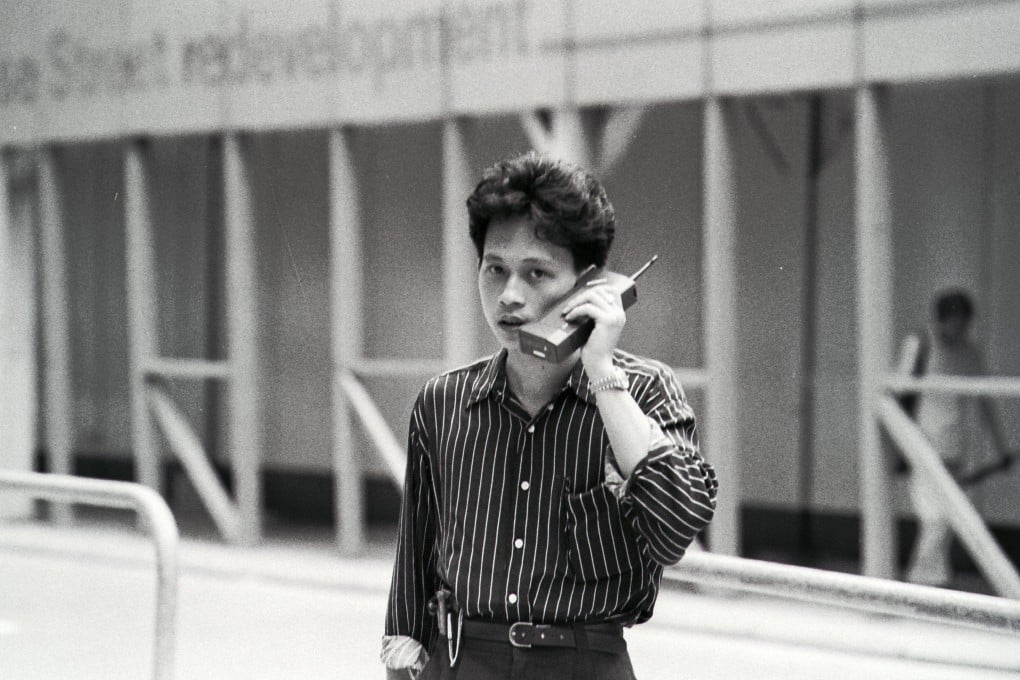 A man talking on a mobile phone in 1989. At the time, only the wealthy could afford hand-held devices. Photo: SCMP Archives
