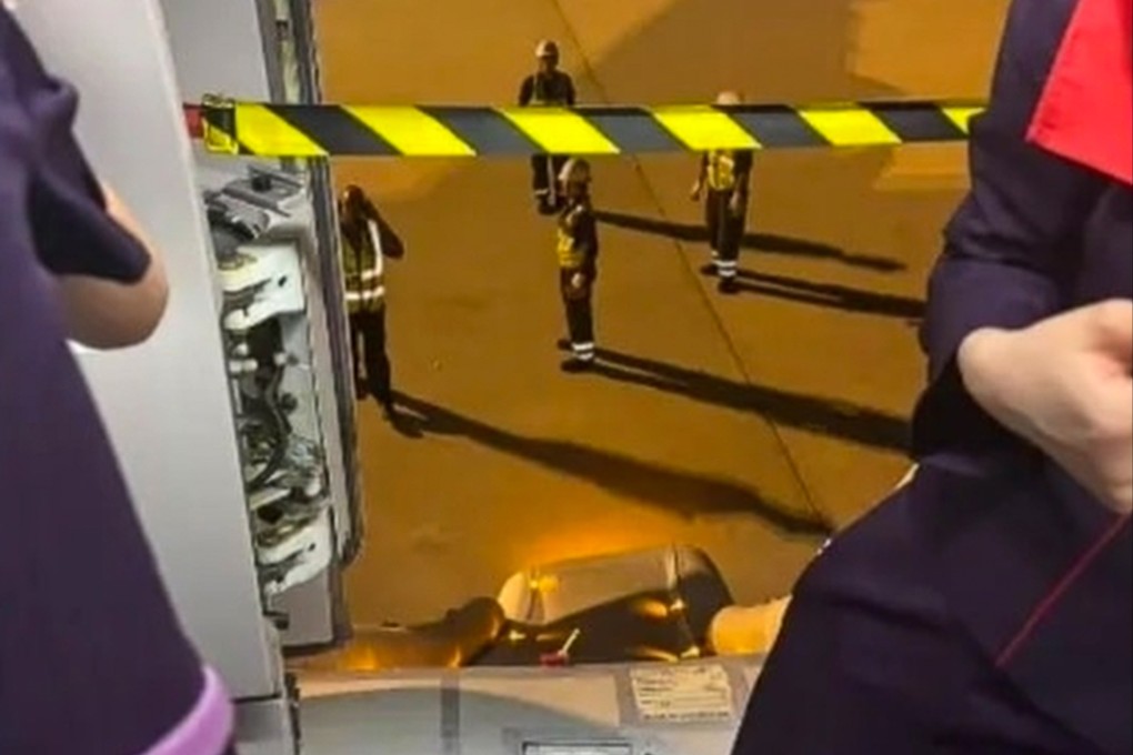 An emergency exit door and evacuation slide were accidentally triggered on a Hong Kong Airlines plane after landing in Osaka. Photo: Handout