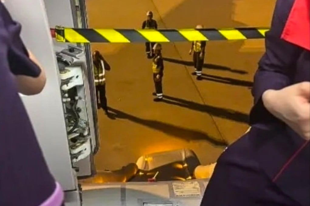 An emergency exit door and evacuation slide were accidentally triggered on a Hong Kong Airlines plane after landing in Osaka. Photo: Handout