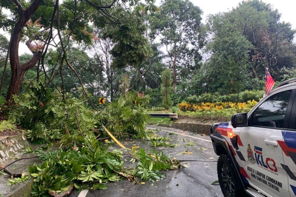 Fallen tree branches block a road in Kuala Lumpur after a storm on Monday. Photo: Facebook/Kuala Lumpur City Hall