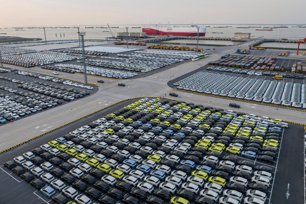 Electric cars made by the Chinese brand BYD are stacked ready to be loaded onto a cargo ship for export at a port in China’s eastern Jiangsu province. Photo: AFP