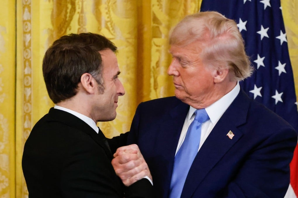 US President Donald Trump (right) and French President Emmanuel Macron shake hands in the White House in February. Photo: EPA-EFE