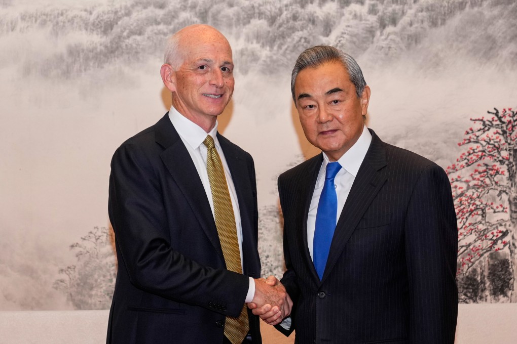 US Representative Adam Smith (left) shakes hands with Chinese Foreign Minister Wang Yi as he leads a bipartisan group of US lawmakers for a meeting at the Great Hall of the People in Beijing on Tuesday. Wang called on Washington to treasure the current “stabilising trend” in bilateral relations while upholding its “political commitments” regarding Taiwan. Photo: EPA/POOL