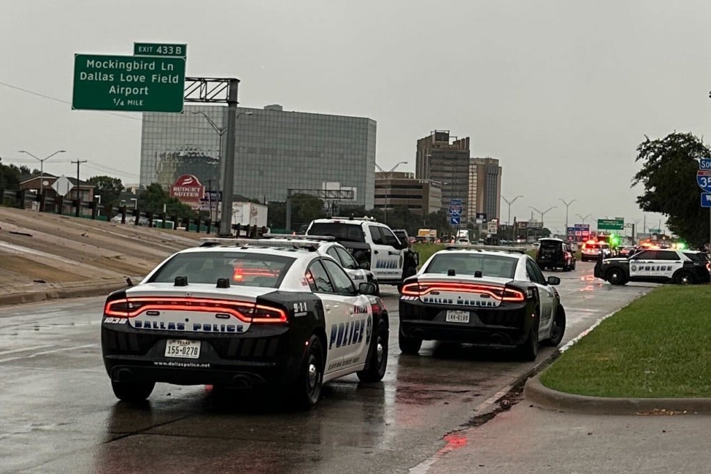 Police block off a highway close to a US Immigration and Customs Enforcement office after a shooting, in Dallas on Wednesday. Photo: AP