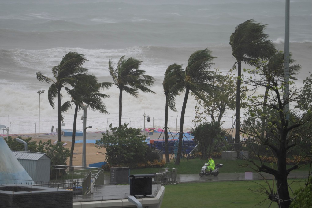 A security person patrols along a beach in Shenzhen, as Super Typhoon Ragasa moves near the area. Photo: AP