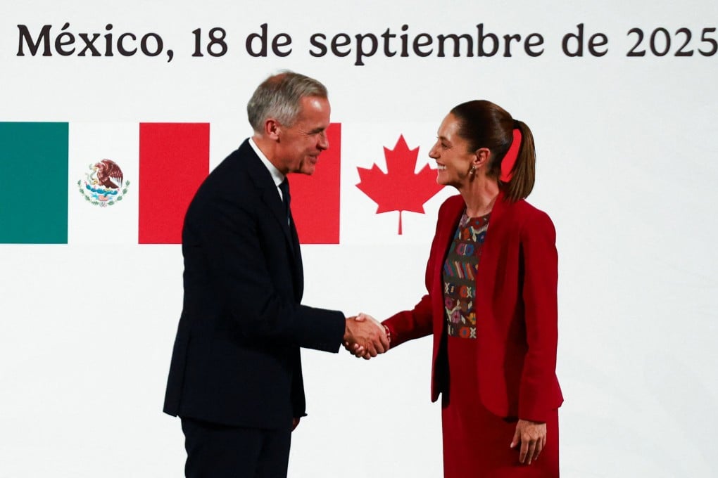 Mexican President Claudia Sheinbaum and Canadian Prime Minister Mark Carney shake hands as they hold a press conference at the National Palace in Mexico City on September 18. Photo: Reuters