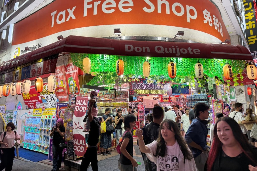 People walk in a shopping area in Tokyo’s Shinjuku on September 11. Japan is experiencing cost-push inflation – price rises driven by the weak yen and exacerbated by the cost of imported raw materials, food and energy. Photo: Reuters