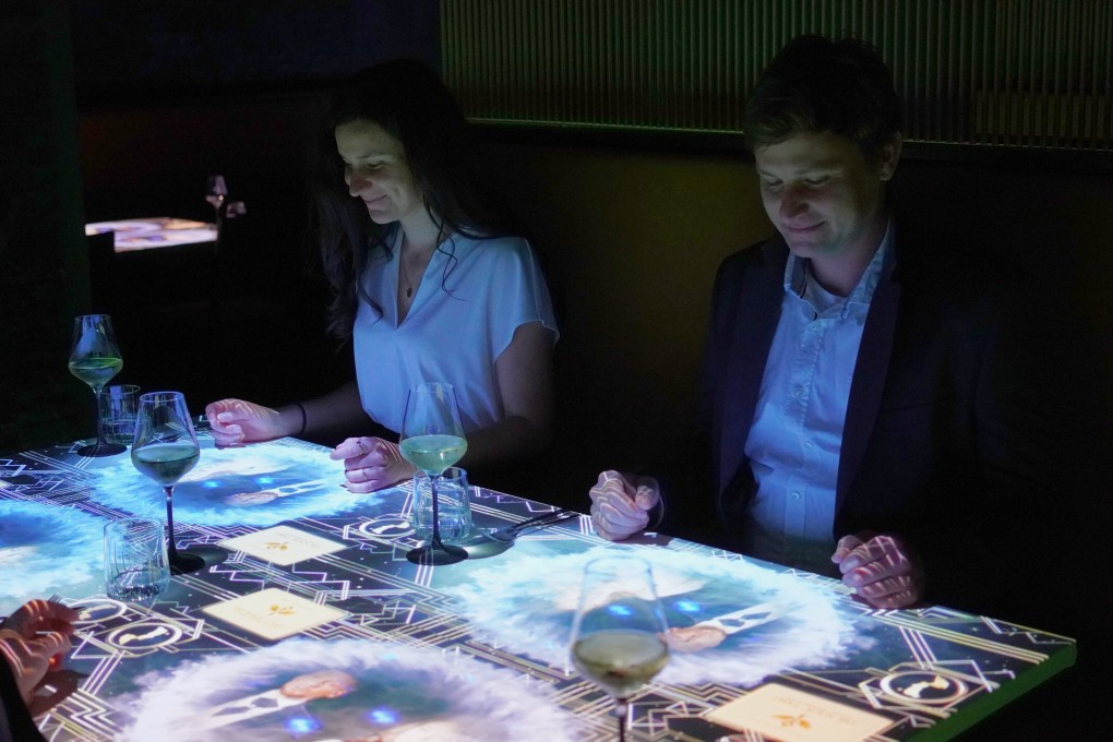 Guests enjoy a show with their meal at The Magic Table experience at the Grand Hyatt Hong Kong. Photo: Handout