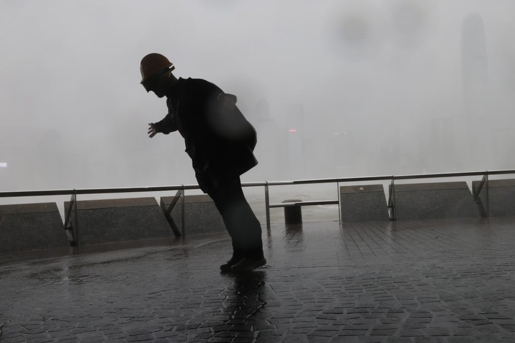 A storm chaser at the Tsim Sha Tsui waterfront during Super Typhoon Ragasa on September 24. Photo: Jelly Tse