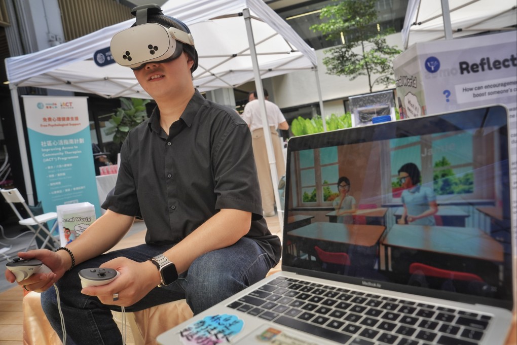 A man tries a virtual reality experience that takes users back to school to allow them to interact with classmates requiring peer support at the Psychology and Mental Health Fair 2025 organised by the Hong Kong Society of Psychology and Innovation at Central Market on July 19. Photo: Elson Li