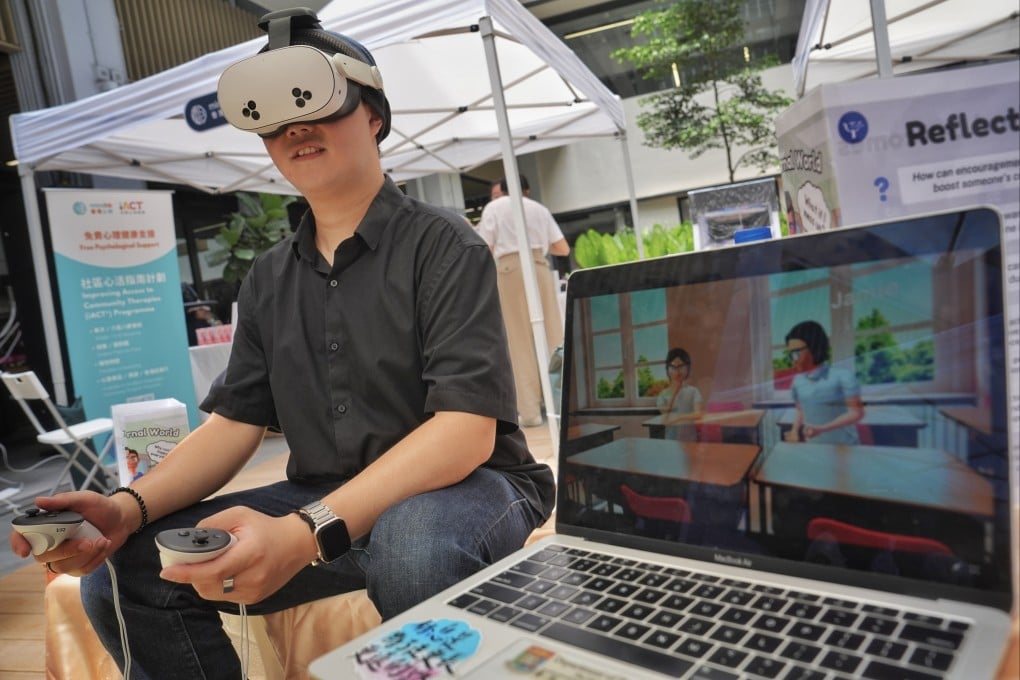A man tries a virtual reality experience that takes users back to school to allow them to interact with classmates requiring peer support at the Psychology and Mental Health Fair 2025 organised by the Hong Kong Society of Psychology and Innovation at Central Market on July 19. Photo: Elson Li