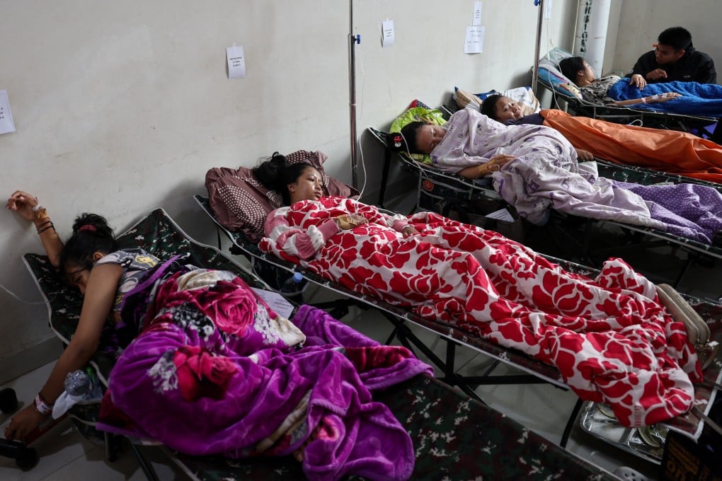 Students rest while receiving treatments for food poisoning after eating government-sponsored free school meals, at a hospital in Bandung, West Java, Indonesia, on Thursday. Photo: Reuters