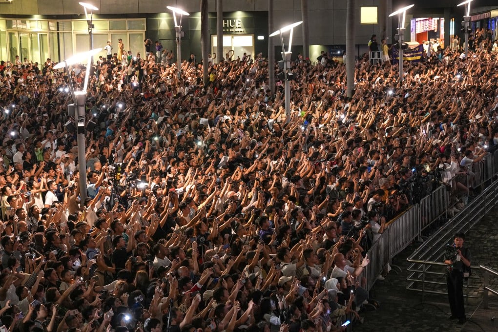 Spectators enjoy National day fireworks in October 2024. Photo: Eugene Lee