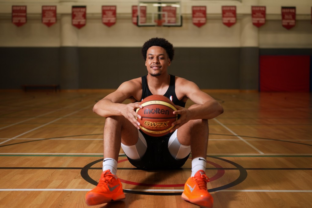 David Muoka returned to his old stomping ground at West Island School to talk to the next generation of basketball players. Photo: Elson Li