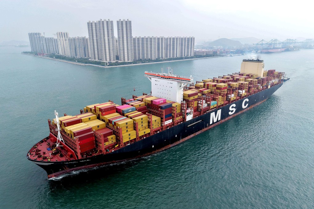 A container ship moves towards its berth in Qingdao, Shandong province, on Wednesday. Photo: AFP