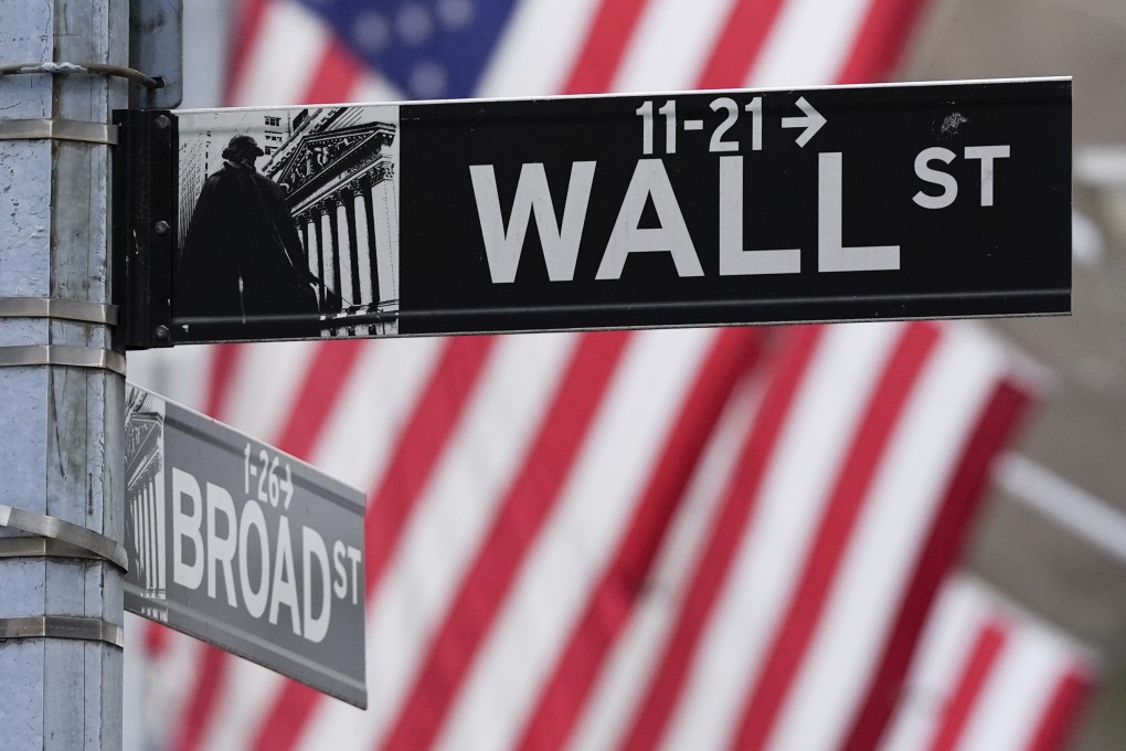 A sign outside the New York Stock Exchange marks the intersection of Wall and Broad Streets, pictured on January 28, 2025. Photo: AP Photo