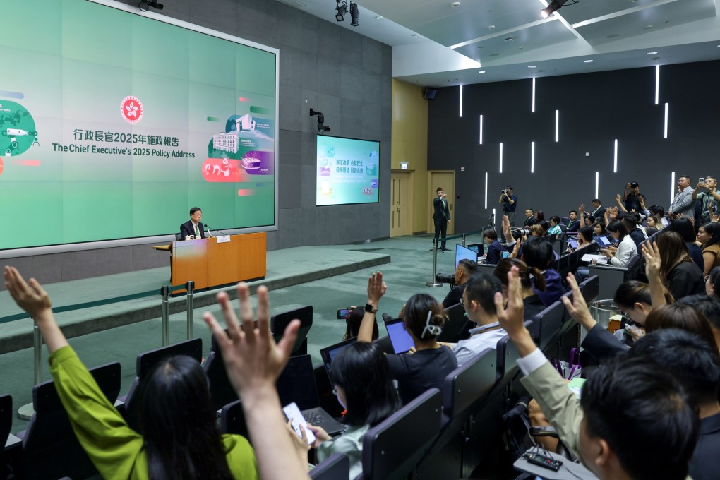 Journalists raise their hands to ask questions as Hong Kong Chief Executive John Lee Ka-chiu explains his policy address at a press conference on September 17. Photo: Nora Tam