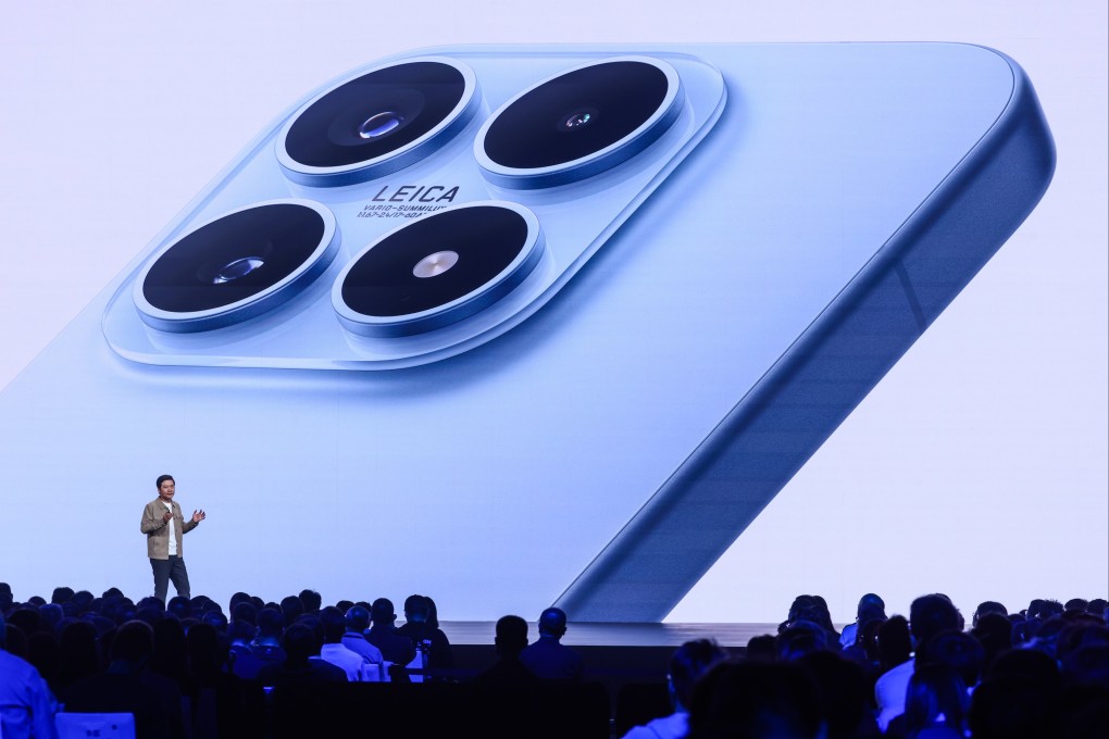 Xiaomi founder, chairman and CEO Lei Jun speaks during the launch of the company’s “17” smartphone series on Thursday. Photo: EPA